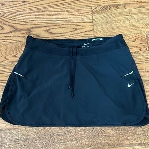 Black Nike mini tennis skirt. Size small